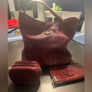 I am selling a Tory Burch Hobo bag, wallet, and small cosmetic case.